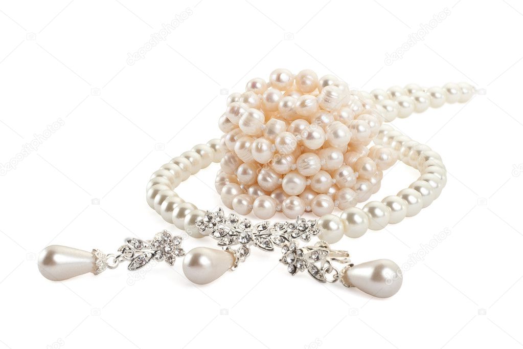 Pearl necklace with earring isolated on white