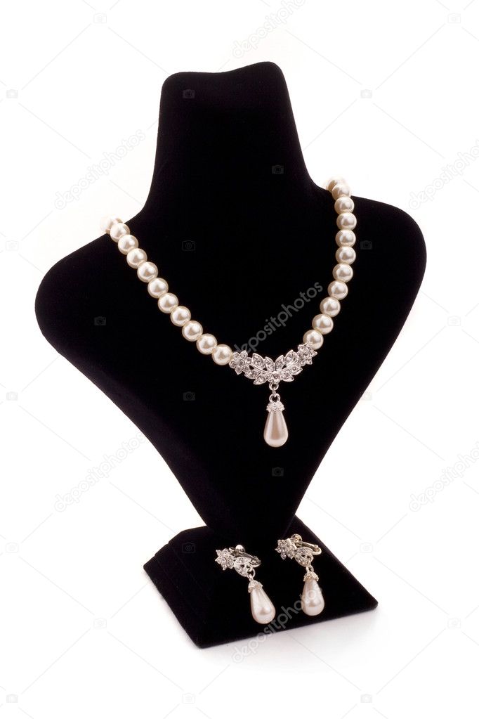 Pearl necklace on black stand