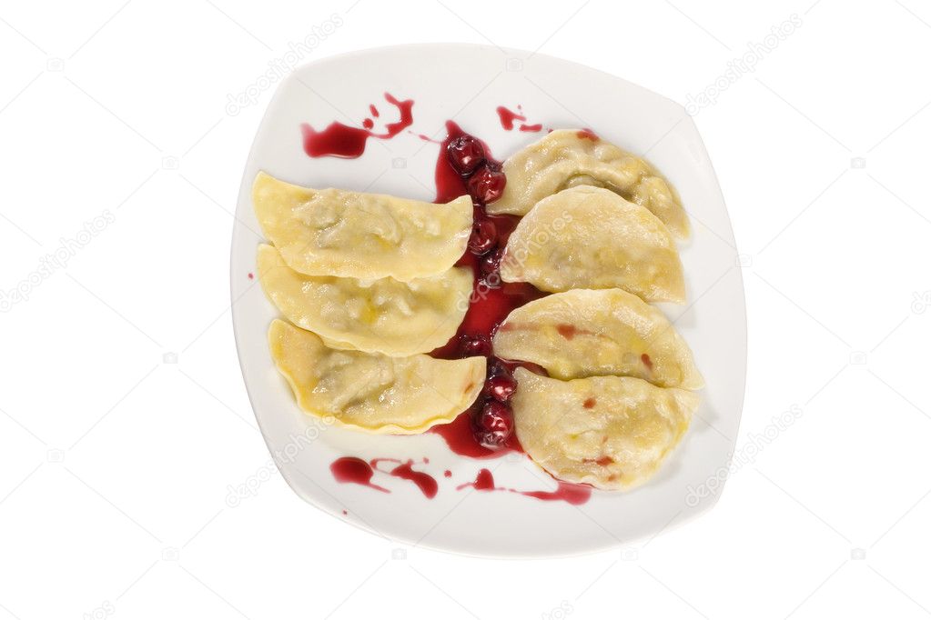 Ukrainian national dish varenyky (ravioli) with cherry closeup. File includes clipping path.