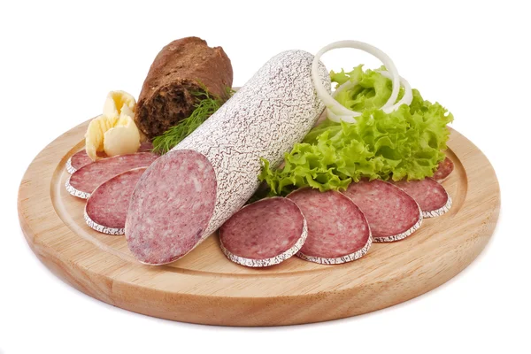 Sliced sausage with bread, butter and vegetables — Stock Photo, Image