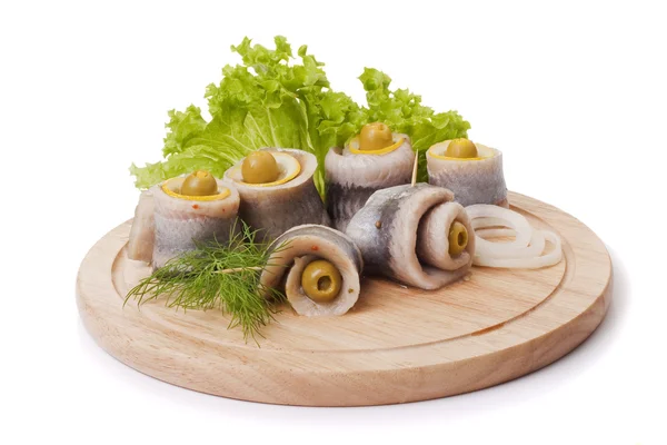 A composition with marinated herring rolls — Stock Photo, Image