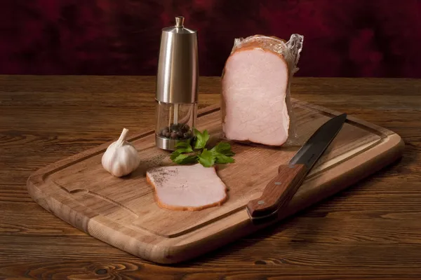 Composition with smoked ham — Stock Photo, Image
