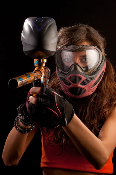 stock image Image of a paintball player in protective helmet aiming the target