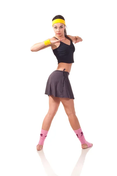 Молодая девушка делает упражнения — стоковое фото