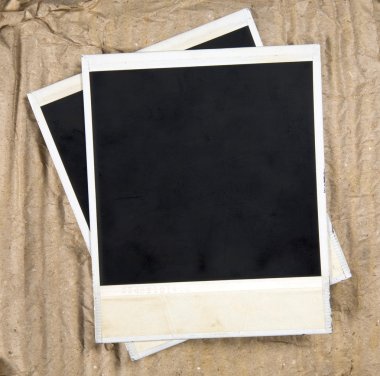 Old Camera Frames On Cardboard Background clipart