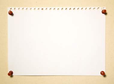 Blank Notepad Page With Red Clips On Textile Background clipart