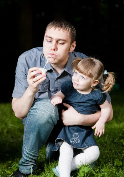 Father Daughter Blowing Soap Bubbles — Stock Photo, Image