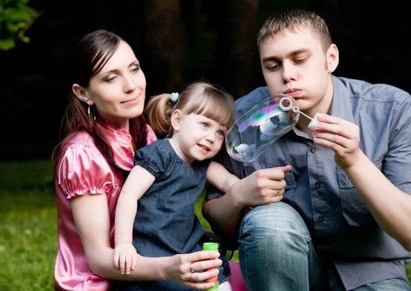 Father Blowing Big Soap Bubble Happy Family Portrait — Stock Photo, Image