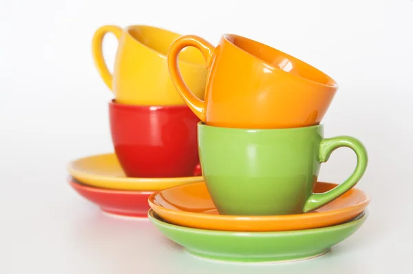 Четыре разноцветные чашки — стоковое фото