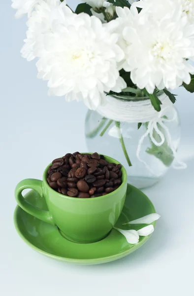 Green cup with coffee — Stock Photo, Image
