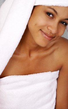 Beautiful female at the spa. clipart