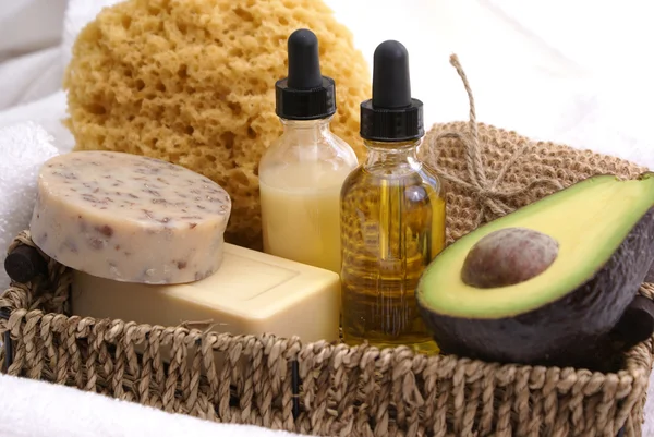 stock image An array of products for a relaxing avocado oatmeal spa treatment.