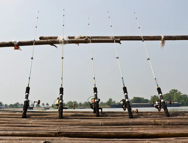 Fishing Poles on Pier — Stock Photo, Image