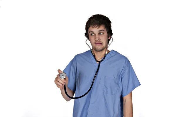 Legrační muž s stetoskop — Stock fotografie