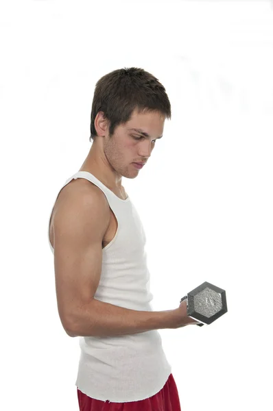 Teenager holding weight — Stock Photo, Image