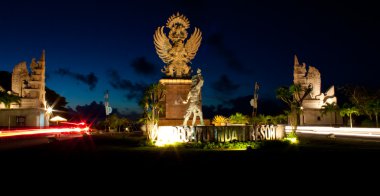 Entrance of new Pecatu indah resort by night clipart