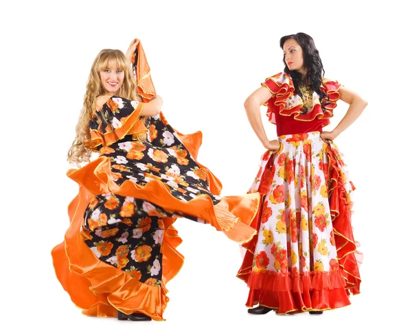 Две зрелые женщины танцуют фламенко в цыганском костюме — стоковое фото