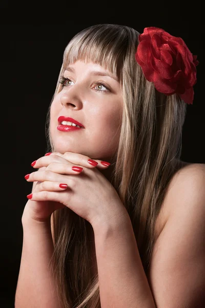Happy Blond With Red Flower in hair — Stock Photo, Image