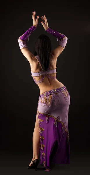 Woman dance in traditional arabian costume - back — Stock Photo, Image