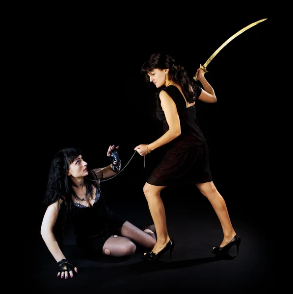 Two woman fight with sword