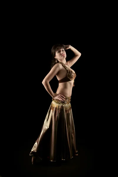 Beautiful arabic woman dance in bronze dress — Stock Photo, Image