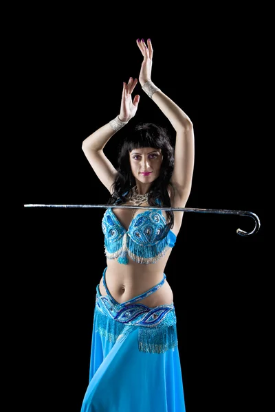 Mujer en danza azul con bastón — Foto de Stock