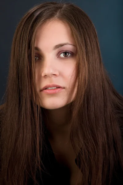 Young woman with long hair in sad — Stock Photo, Image