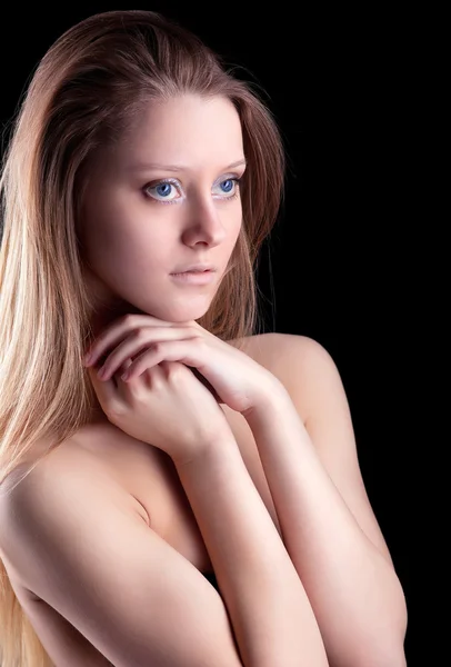 Красавица голая девушка смотрит на свет — стоковое фото