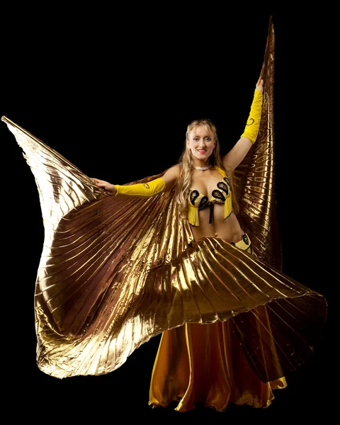 Mujer rubia bailando con ala dorada — Foto de Stock