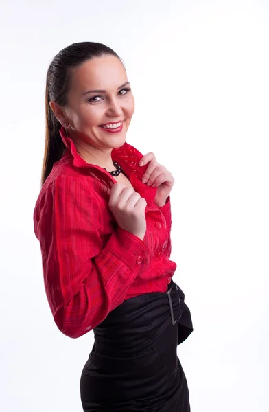 Příležitostné žena v červeném vyhovovat úsměv — Stock fotografie