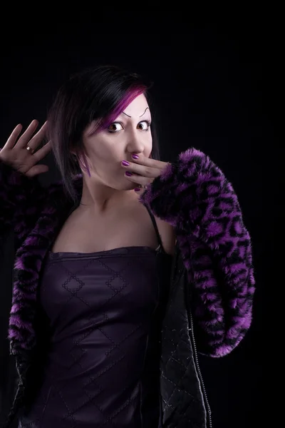 Young girl in purple fur confused look at you — Stock Photo, Image