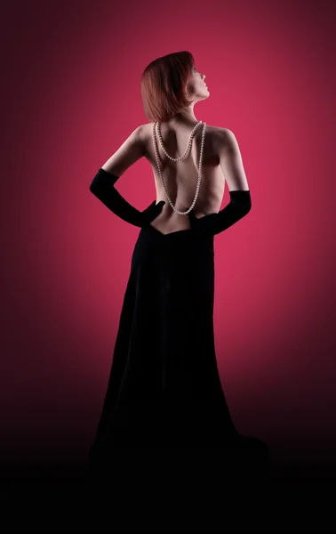 Ritratto glamour donna in rosso scuro — Foto Stock