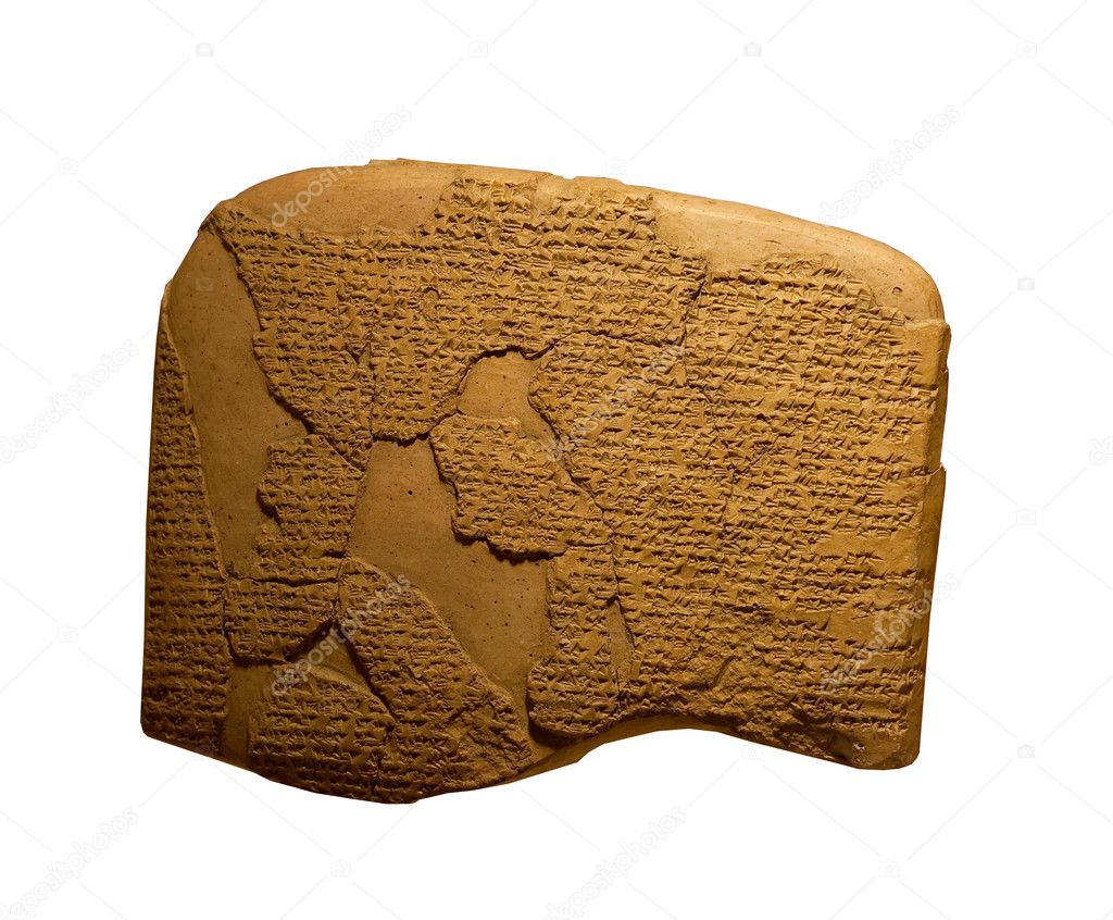 Ancient cuneiform writing on clay tablets