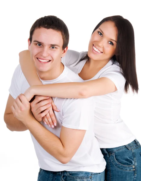白い背景の上の美しい若いカップル — ストック写真