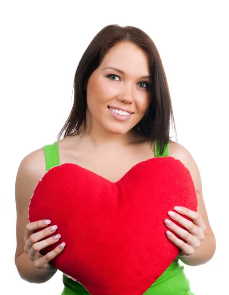 Young brunette with red heart isolated Stock Picture