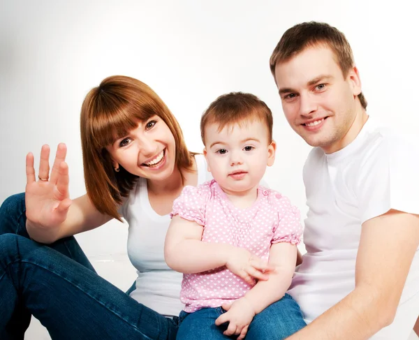 Lycklig Familj Med Ett Barn Vit Bakgrund — Stockfoto