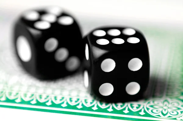 Dice on a soft — Stock Photo, Image