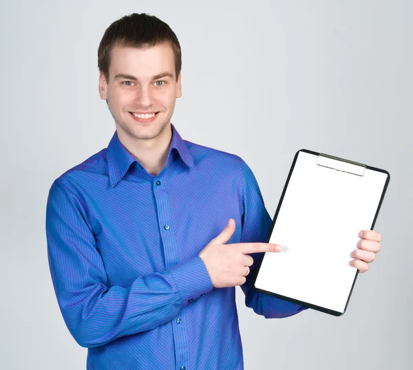 Jonge Man Een Bruin Shirt Met Een Tablet Voor Notities — Stockfoto