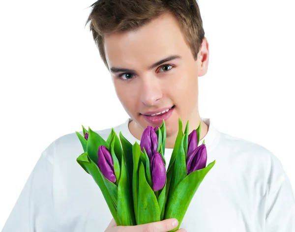 Schöner Junger Mann Mit Einem Strauß Tulpen — Stockfoto