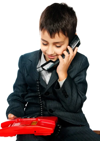 Мальчик Разговаривает Телефону Изолированы Белом Фоне — стоковое фото