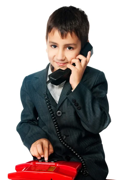 Молодий Хлопчик Говорить Телефону Ізольовано Білому Тлі — стокове фото