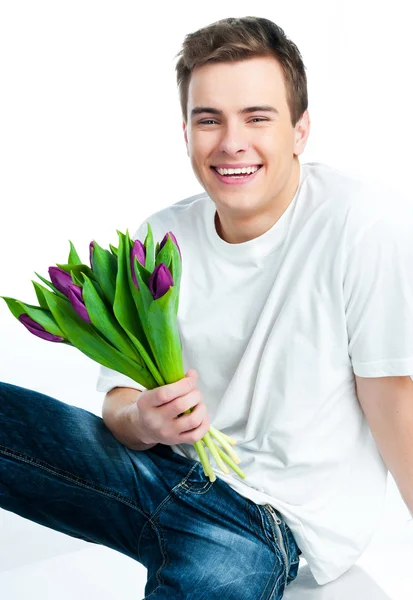 Человек с букетом тюльпанов — стоковое фото