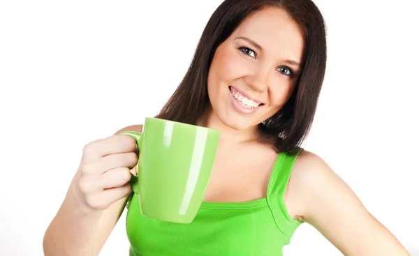 Pretty girl with a green cup — Stock Photo, Image