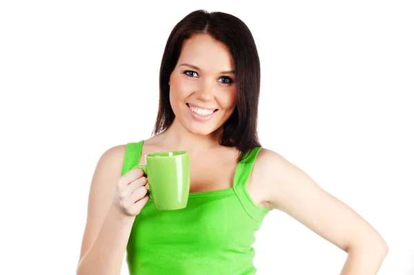 Hübsches Mädchen mit einer grünen Tasse — Stockfoto