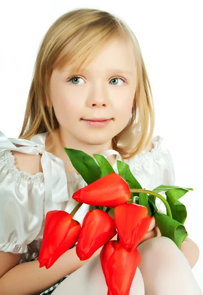 Дівчинка з квітами — стокове фото