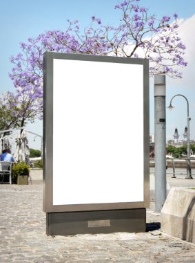 Outdoor blank billboard on city background clipart