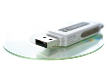 Miniature 3 inch CDR and thumbdrive. Small technology. clipart