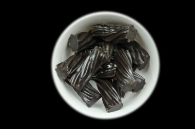 Black Australian Licorice in bowl clipart