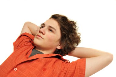 Young adult looking up with arms behind his head, relaxed isolated on white background. clipart