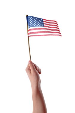 Hand holding American flag in mid air isolated on white background clipart